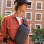 Mochila cruzada gris impermeable Gabol Exit