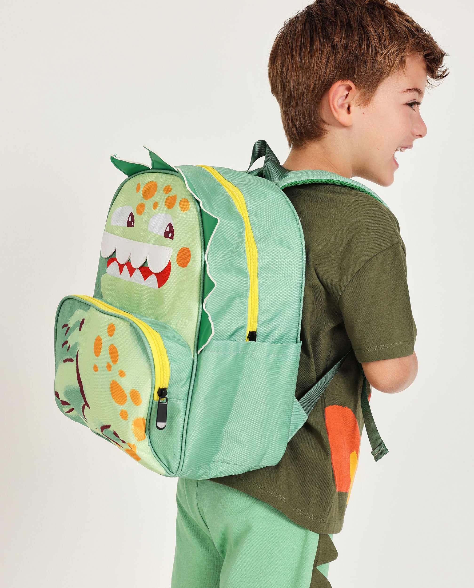 mochila-dinosaurio-366fgm-1.jpg Mochila de niño de plana con diseño dinosaurio Verde / U - Imagen 1